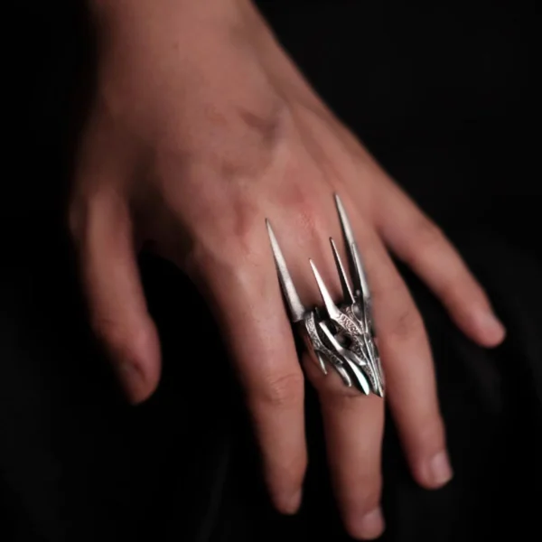 Dark Lord Ring for Men-925 Sterling Silver Gothic Armor Ring 01 A close-up view of a hand wearing the Dark Lord Ring for Men, a 925 Sterling Silver Gothic Armor Ring inspired by Sauron from The Lord of the Rings.