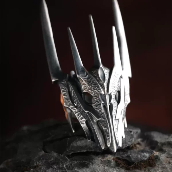 Dark Lord Ring for Men-925 Sterling Silver Gothic Armor Ring 10 Close-up image of the Dark Lord Ring for Men, a handcrafted 925 sterling silver Gothic Armor Ring with an oxidized finish. Designed with intricate engravings and bold, spiked details, this ring embodies dark elegance and power. Inspired by Sauron from The Lord of the Rings, it features a dramatic armor-like structure that enhances its commanding presence.