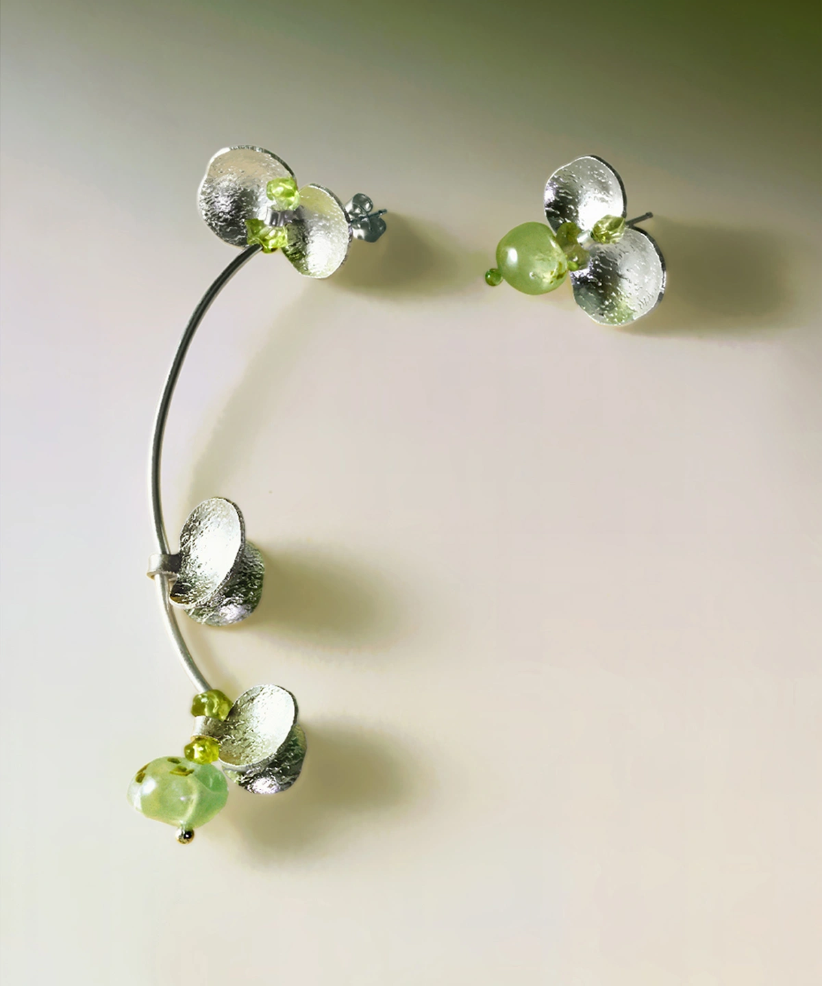 Elegant handmade Peridot Earrings in S925 sterling silver, featuring natural green prehnite and peridot gemstones in a floral-inspired design. A perfect accessory for summer from Lazesoul Natural Jewelry.