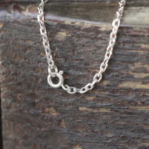 Close-up view of the S925 sterling silver chain with spring ring clasp from the Lazesoul Handmade Natural Aquamarine Necklace. Elegant and durable jewelry featuring Natural Aquamarine accents.
