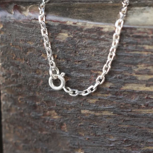 925 Silver Natural Aquamarine Necklace 03 Close-up view of the S925 sterling silver chain with spring ring clasp from the Lazesoul Handmade Natural Aquamarine Necklace. Elegant and durable jewelry featuring Natural Aquamarine accents.