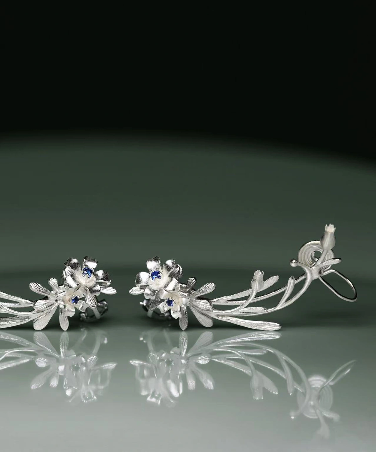 Lily Earrings in S925 sterling silver with a lab-created sapphire accent; handmade ear cuffs with floral design by Lazesoul, blending natural elegance with artistic craftsmanship.