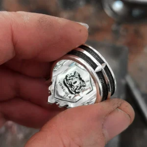 Close-up of Lazesoul's S925 Sterling Silver Guardian Ring inspired by Katekyo Hitman Reborn. Features the Vongola crest with detailed, polished silverwork. Handmade anime jewelry perfect for fans and collectors.