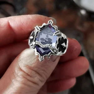 Hand holding the Lazesoul S925 Sterling Silver Guardian Ring-Mist Ring inspired by Katekyo Hitman Reborn; features a vivid purple gemstone engraved with “Vongola.” Elegant anime jewelry for fans and collectors.