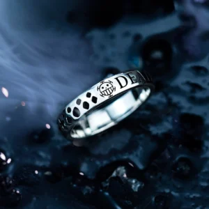 S925 sterling silver Pirates Ring featuring Trafalgar D. Water Law's Heart Pirates Jolly Roger. A handcrafted anime accessory with skull motif and “DEATH” engraving on black textured background.