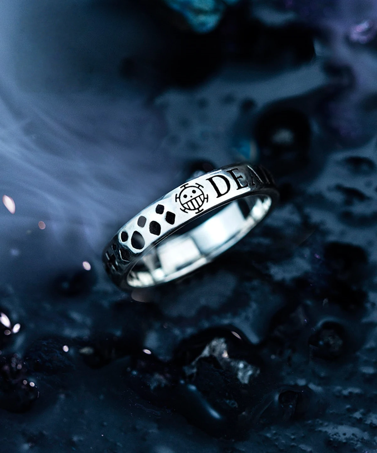 S925 sterling silver Pirates Ring featuring Trafalgar D. Water Law's Heart Pirates Jolly Roger. A handcrafted anime accessory with skull motif and “DEATH” engraving on black textured background.