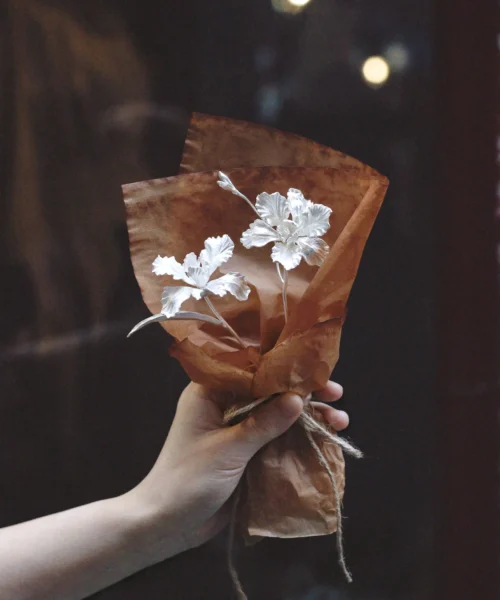 A delicate handmade Iris Bouquet wrapped in rustic brown paper, featuring Lazesoul’s 925 sterling silver artistry. Perfect as timeless Art Gifts, this mini bouquet captures elegance, craftsmanship, and nature-inspired beauty.