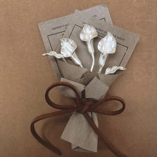 Handmade 925 sterling silver mini Calla Lily Bouquet by Lazesoul, wrapped in vintage brown paper with velvet ribbon. Elegant art gift for home décor, anniversaries, or special occasions. Perfect collectible for Calla Lily Bouquet lovers.