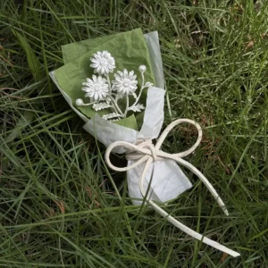 Handcrafted 925 sterling silver mini daisy bouquet with delicate white petals, wrapped in green and white tissue with ribbon. Perfect handmade art gift for nature lovers, weddings, or home décor. Lazesoul Daisy Bouquet Art Gifts.