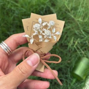 Handcrafted 925 sterling silver mini rose bouquet wrapped in rustic brown paper, tied with twine. A unique handmade art gift by Lazesoul, perfect for romantic keepsakes, anniversaries, or elegant home décor. Keywords: Rose Bouquet, Art Gifts.