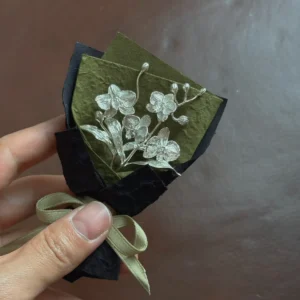 Handcrafted 925 sterling silver Phalaenopsis mini bouquet wrapped in black and olive paper with beige ribbon. Elegant handmade art gift by Lazesoul, perfect for unique floral-inspired jewelry and collectible art gifts.