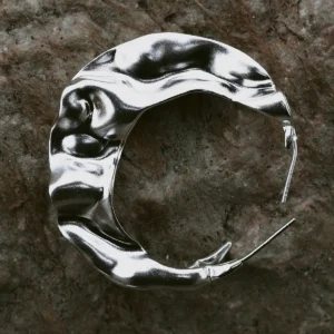 Handcrafted 990 pure silver Moon Earrings with a sculptural, wavy crescent design. Polished to a mirror shine, these artistic earrings reflect light beautifully, embodying Lazesoul’s signature handmade elegance and celestial inspiration.