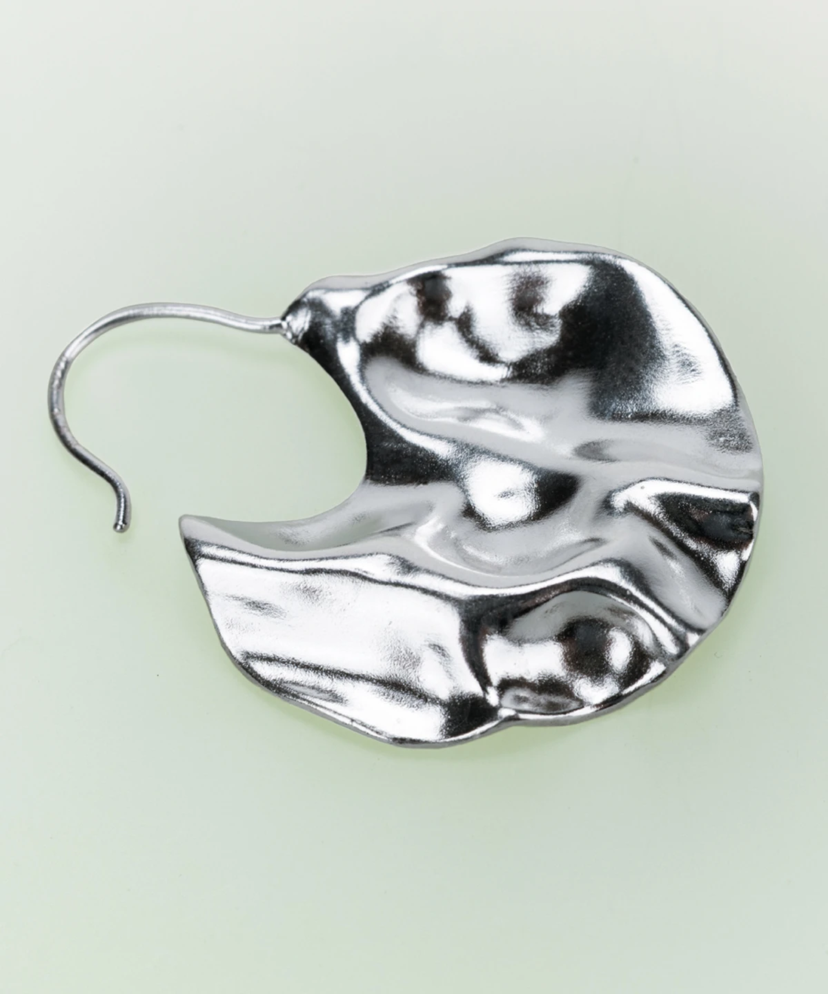 Handcrafted 990 pure silver Moon Earrings with a sculptural, fluid moon-inspired design. Featuring organic curves and a reflective finish, these Lazesoul handmade art jewelry pieces embody modern elegance and celestial charm.