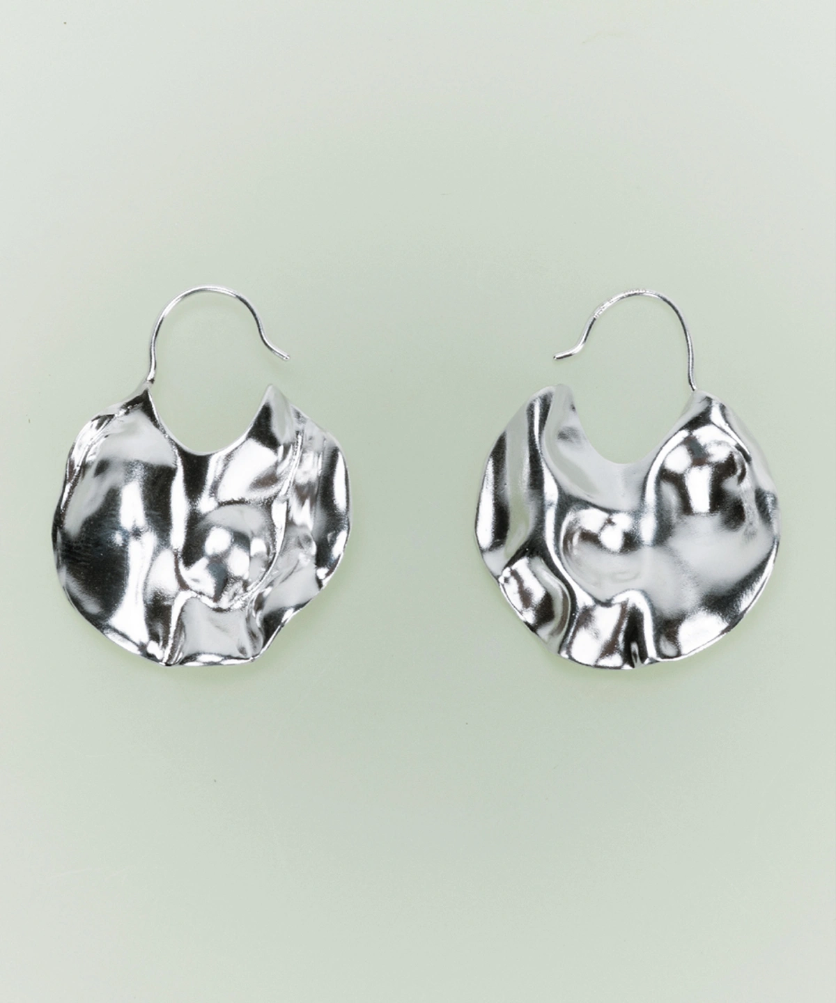 Handmade 990 pure silver Moon Earrings by Lazesoul, featuring sculptural, crumpled moon-inspired discs with a reflective finish. Modern art jewelry blending celestial elegance with contemporary design.