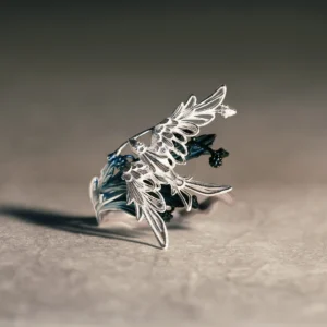 A handmade 925 sterling silver open adjustable statement ring featuring a design of stray birds gliding over tree branches, with intricate feather details and artisan craftsmanship by Lazesoul.