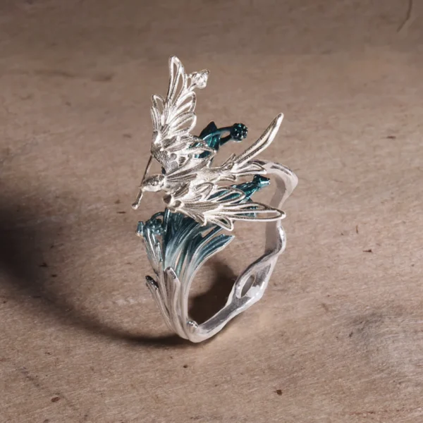 Handmade 925 sterling silver open adjustable statement ring featuring a bird in flight gracefully passing over tree‑branch inspired details, part of Lazesoul’s Stray Birds natural jewelry collection.