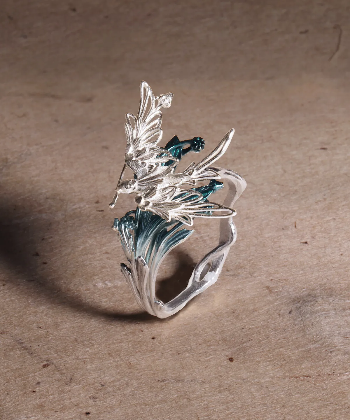 Handmade 925 sterling silver open adjustable statement ring featuring a bird in flight gracefully passing over tree‑branch inspired details, part of Lazesoul’s Stray Birds natural jewelry collection.