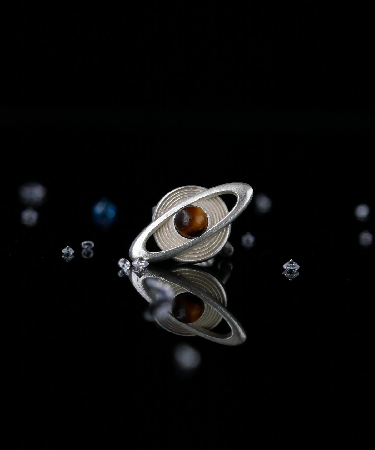 Lazesoul handmade Saturn Earrings in 925 sterling silver with polished tiger’s eye gemstones, designed with orbit-inspired bands that echo Saturn’s rings; celestial artisan jewelry blending cosmic elegance, astronomy symbolism, and timeless craftsmanship.