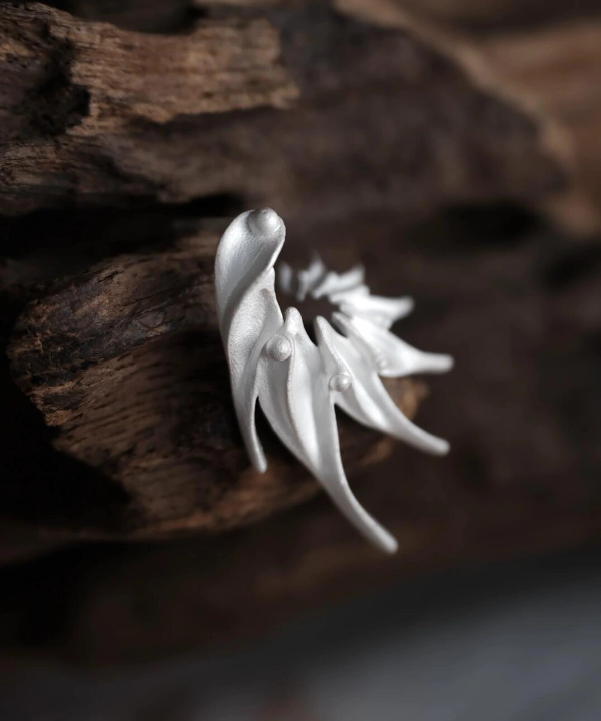 Ethereal Wings S925 Sterling Silver Designer Earrings by Lazesoul. Handmade art jewelry with flowing petal‑like curves, sculptural organic forms, and polished silver finish. Unique designer earrings showcasing elegance, craftsmanship, and timeless artistry.