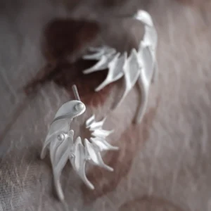 Ethereal Wings S925 Sterling Silver Designer Earrings by Lazesoul. Handmade art jewelry with feather‑like curves and sculptural organic forms. Unique designer earrings crafted with elegance, artistry, and timeless sophistication for modern style.