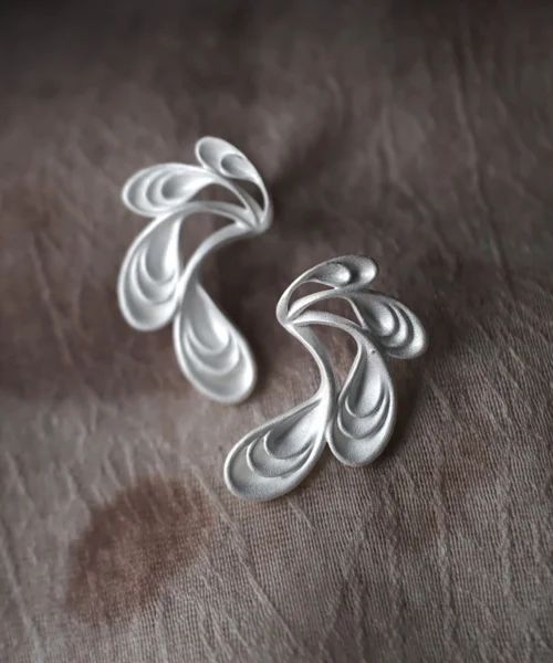 Elegant Sylph Dancer S925 Sterling Silver Handmade Earrings with flowing leaf‑inspired curves, artisan crafted by Lazesoul. Fantasy art jewelry design with organic movement and timeless shine.