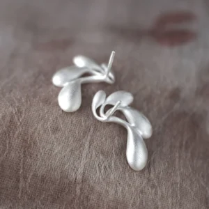 Sylph Dancer S925 Sterling Silver Fantasy Handmade Earrings by Lazesoul. Sculptural droplet‑like curves with matte finish, artisan craftsmanship, and organic elegance. Unique Handmade Earrings blending fantasy, nature, and contemporary jewelry design.