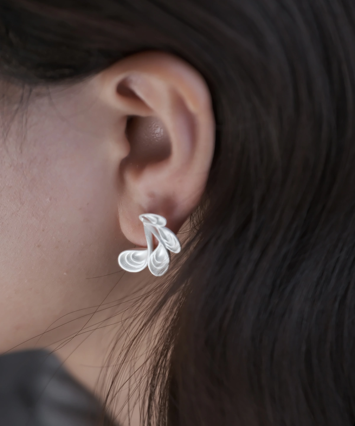 Sylph Dancer S925 Sterling Silver Fantasy Handmade Earrings by Lazesoul. Close‑up view shows layered petal‑like silver design with polished shine, artisan craftsmanship, and fantasy‑inspired elegance. Unique Handmade Earrings blending art and nature.
