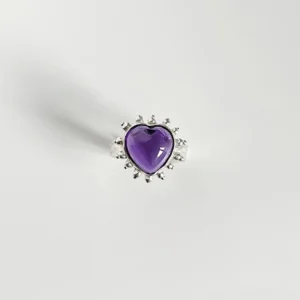 February Birthstone Ring-Natural Amethyst Ring in Sterling Silver 08 Silver ring with heart-shaped natural amethyst gemstone and beaded sunburst detailing, showcasing the February Birthstone Ring in sterling silver on a white surface.