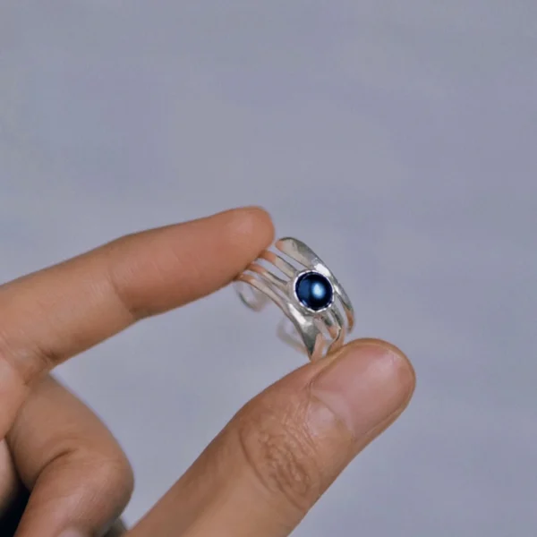 June Birthstone Ring-Natural Black Pearl Ring in Sterling Silver 12 Elegant June Birthstone Ring featuring a natural black pearl set in a sterling silver band with parallel lines; handcrafted silver ring design highlights the deep blue-black pearl, ideal for showcasing artisanal craftsmanship and timeless elegance.