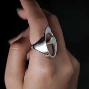 Arc Glow S925 Sterling Silver Ring with sculptural open design and smooth polished surfaces; a nature-inspired Unique Ring featuring organic curves and subtle ridged textures, worn on hand and styled against a dark background.