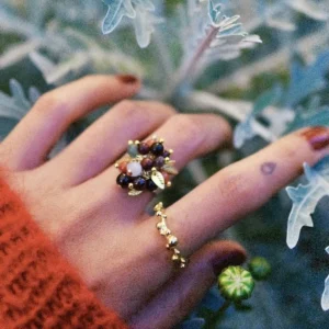 925 Sterling Silver Ring with multicolored Natural Stone beads and golden leaf accents, worn on hand with floral gold band; a handcrafted Silver Ring styled against frosty foliage and rust-colored knitwear.