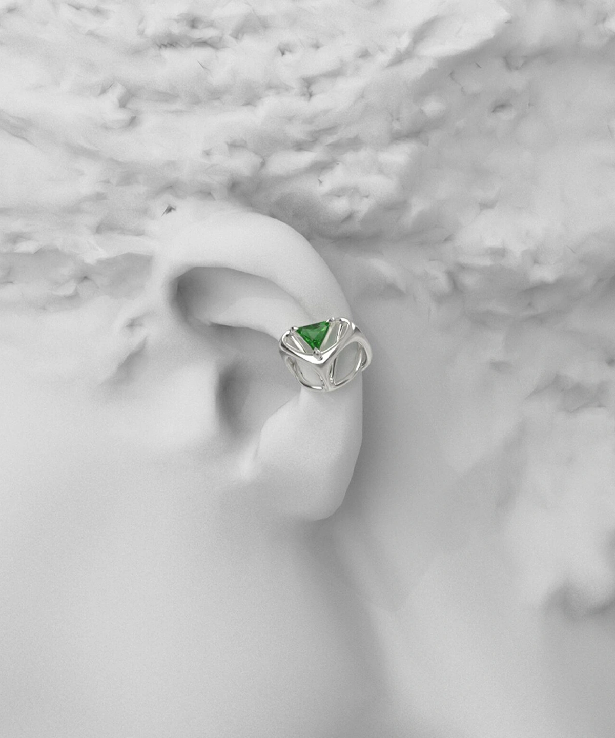 Dreamscape Garden S925 Silver Ear Cuff with green triangular gemstone and sculptural silver framework, styled on a matte ear model; a modern Silver Ear Cuff blending geometric elegance and botanical inspiration.