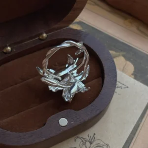 Handmade S925 Sterling Silver Lily Ring 05 Handmade S925 Sterling Silver Lily Ring with sculpted floral petals and leaves, placed in a velvet-lined wooden box; a botanical Silver Ring inspired by the elegance of the lily flower, showcasing artisanal detail and nature-themed craftsmanship.