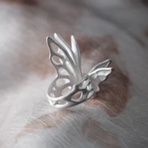 Handmade S925 sterling silver butterfly ring with sculptural openwork wings, inspired by nature and lightness. Artistic Butterfly Ring in matte silver finish, minimalist silver ring design for everyday wear.