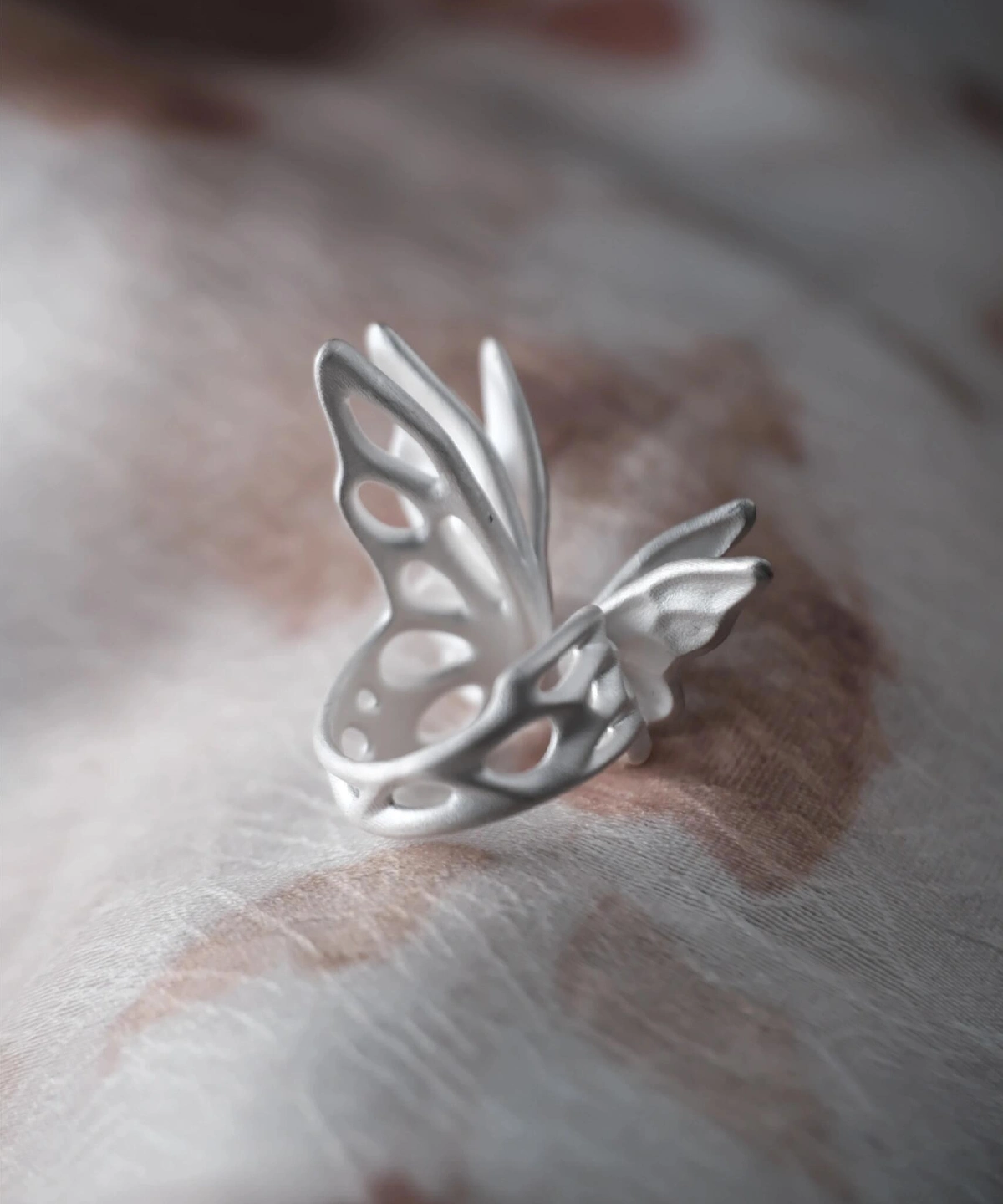 Handmade S925 sterling silver butterfly ring with sculptural openwork wings, inspired by nature and lightness. Artistic Butterfly Ring in matte silver finish, minimalist silver ring design for everyday wear.