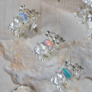 Three Unique Gemstone Ring in S925 silver, orchid-inspired design with iridescent opal-like cabochon gemstones.
