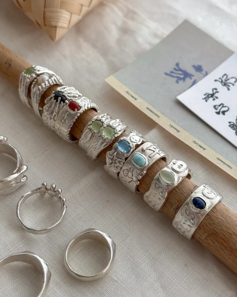 Handmade silver gemstone rings featuring natural colorful stones and artisan settings