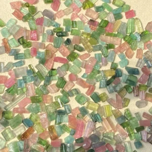 Vibrant natural multi-color tourmaline rough crystals, used in crafting Custom Couple Rings in S925 silver.
