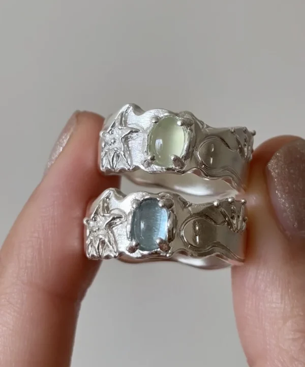 Two handcrafted 999 silver prehnite and aquamarine ring cabochons, star and moon carvings