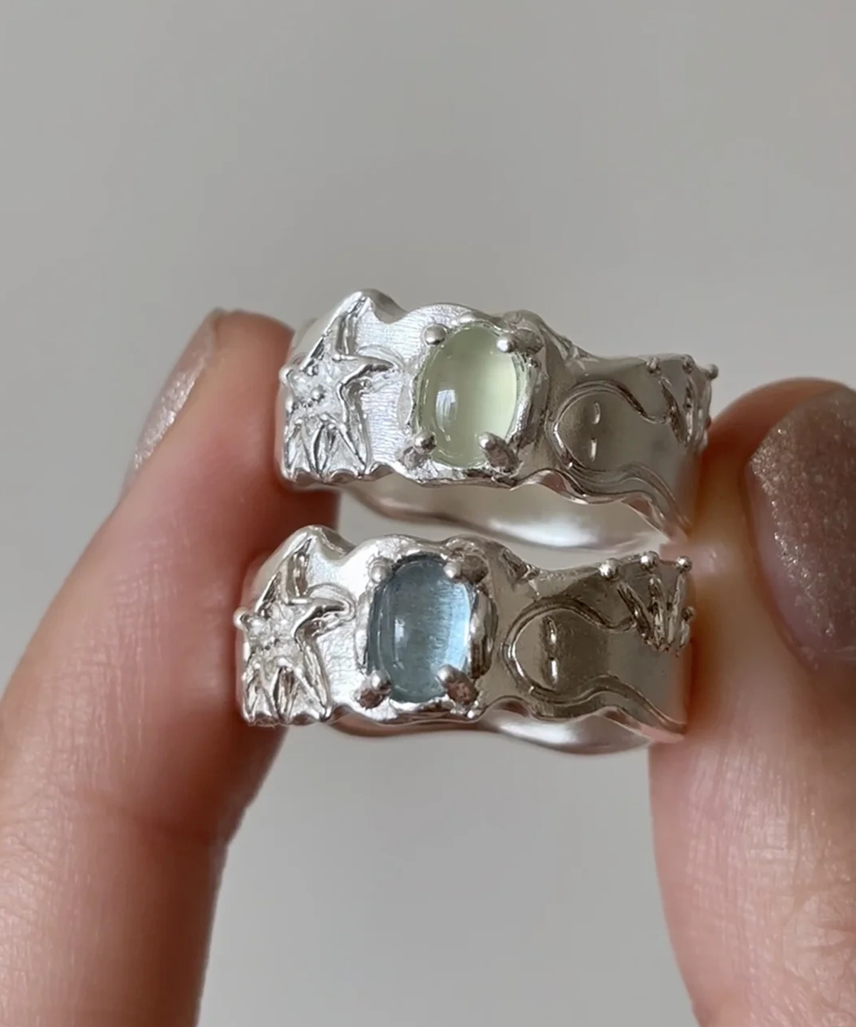 Two handcrafted 999 silver prehnite and aquamarine ring cabochons, star and moon carvings