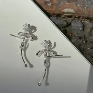 Curved stem iris earrings in S925 shown from behind with straight post fittings