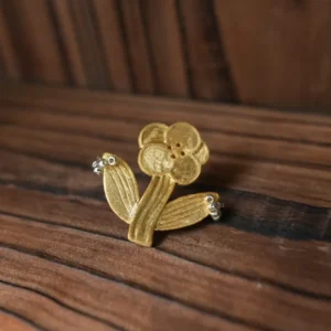 Gold flower stud earring with rounded overlapping petals and small beads at the leaf tips (Style 3)