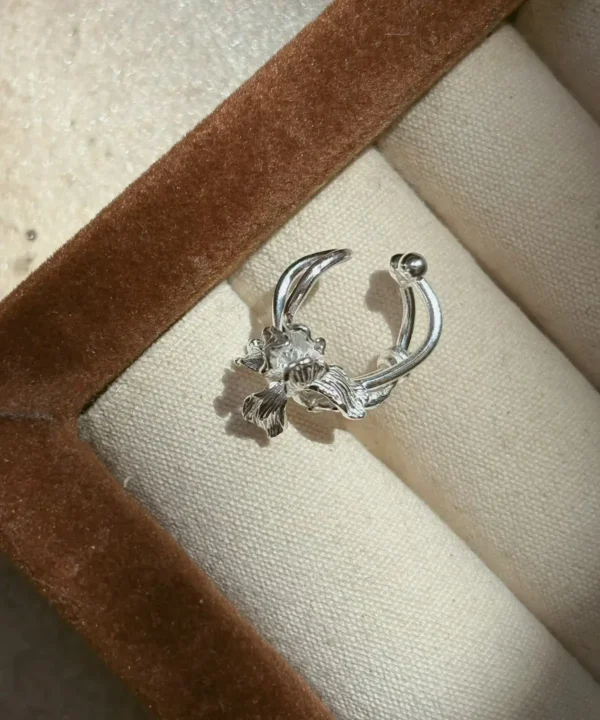 Silver iris flower ear cuff in S925, cast iris bloom on a curved open band