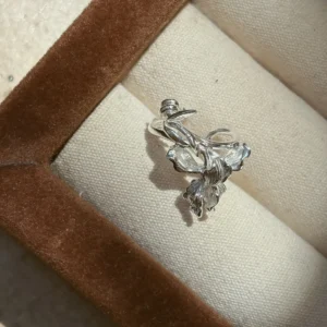 Handmade iris flower ear cuff in S925 sterling silver, falls and standards crimped and veined