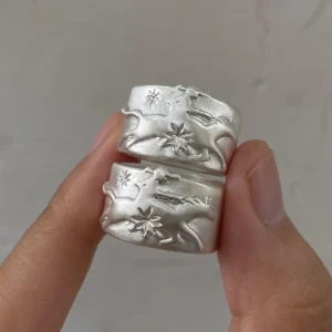Pair of handcrafted 999 silver Cowboy Horse Rings showing carved western details