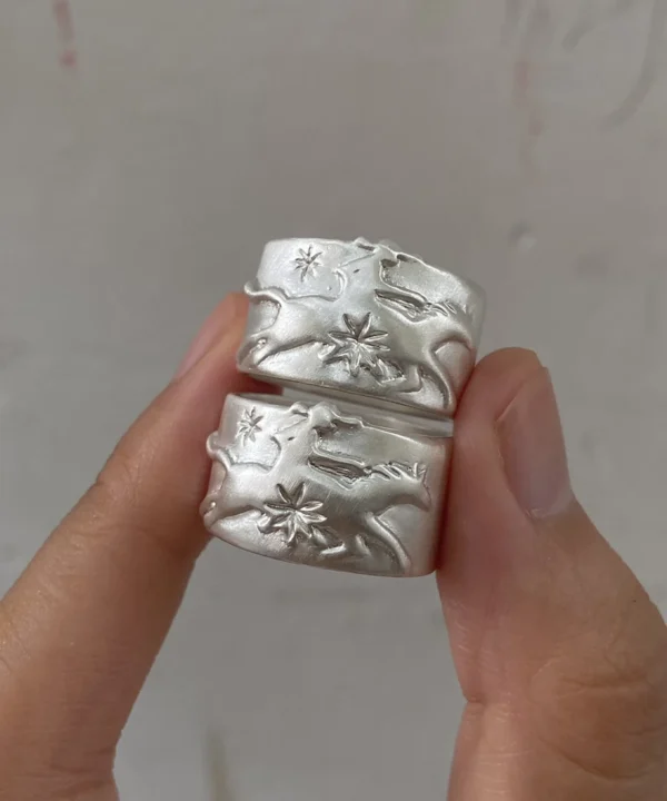 Pair of handcrafted 999 silver Cowboy Horse Rings showing carved western details