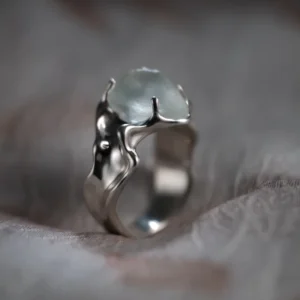 Side profile of a large natural aquamarine ring handcrafted in S925 sterling silver