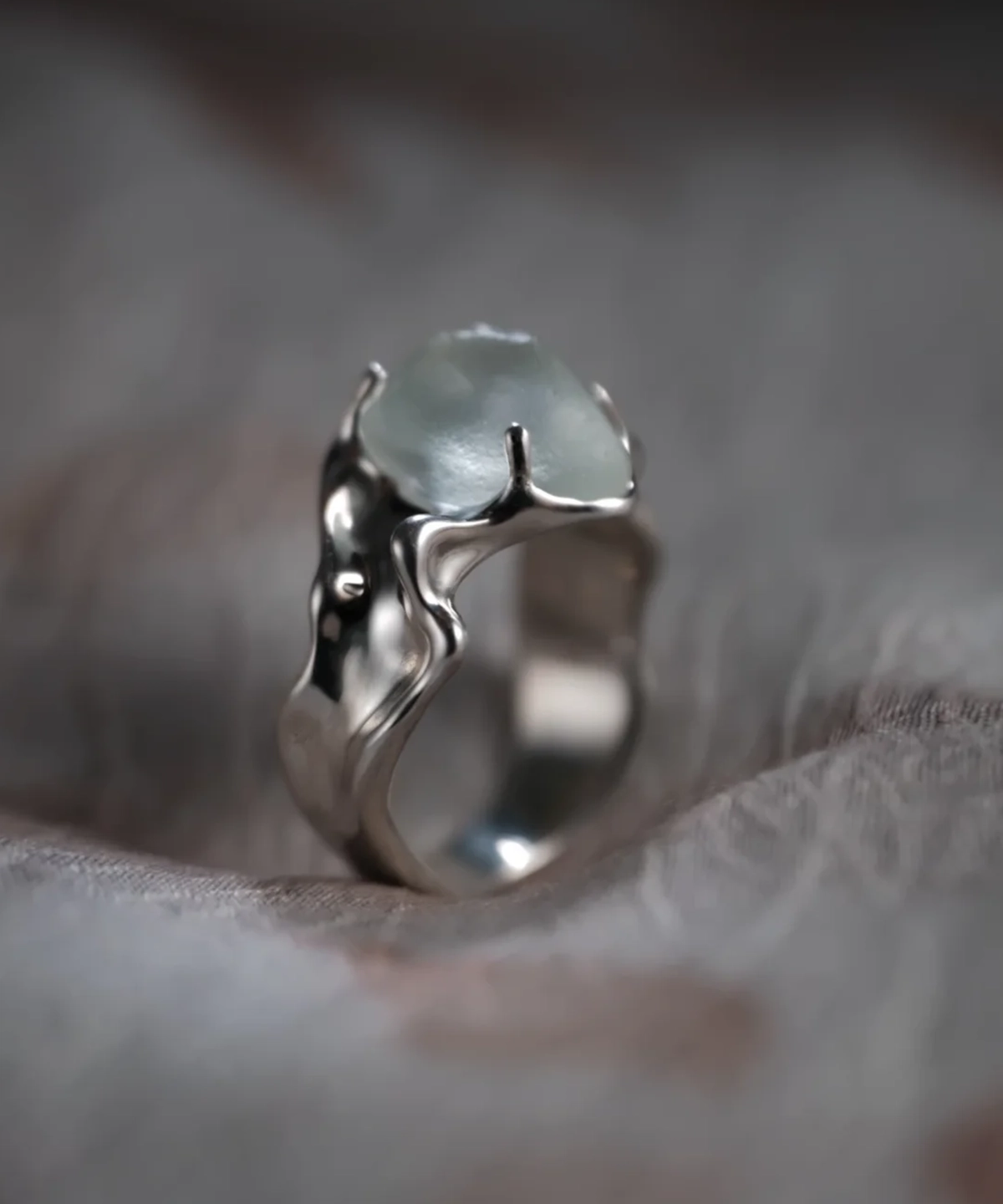Side profile of a large natural aquamarine ring handcrafted in S925 sterling silver