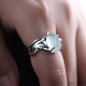 Large irregular natural aquamarine ring in S925 sterling silver worn on a finger