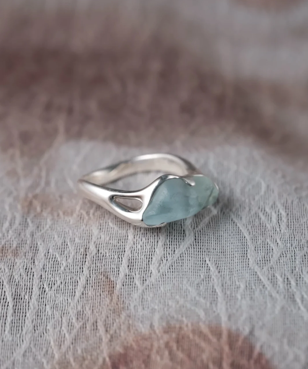 One-of-a-kind natural aquamarine ring handcrafted in S925 sterling silver on textured fabric